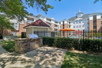 Vibrant outdoor social spaces with gazebo, seating, and grilling and bbq areas